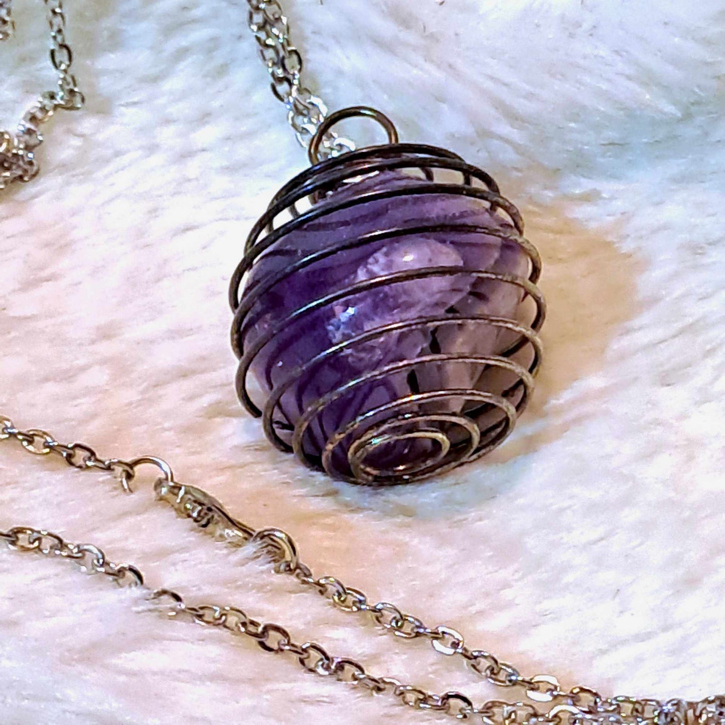 Chevron Amethyst in a Spiral necklace