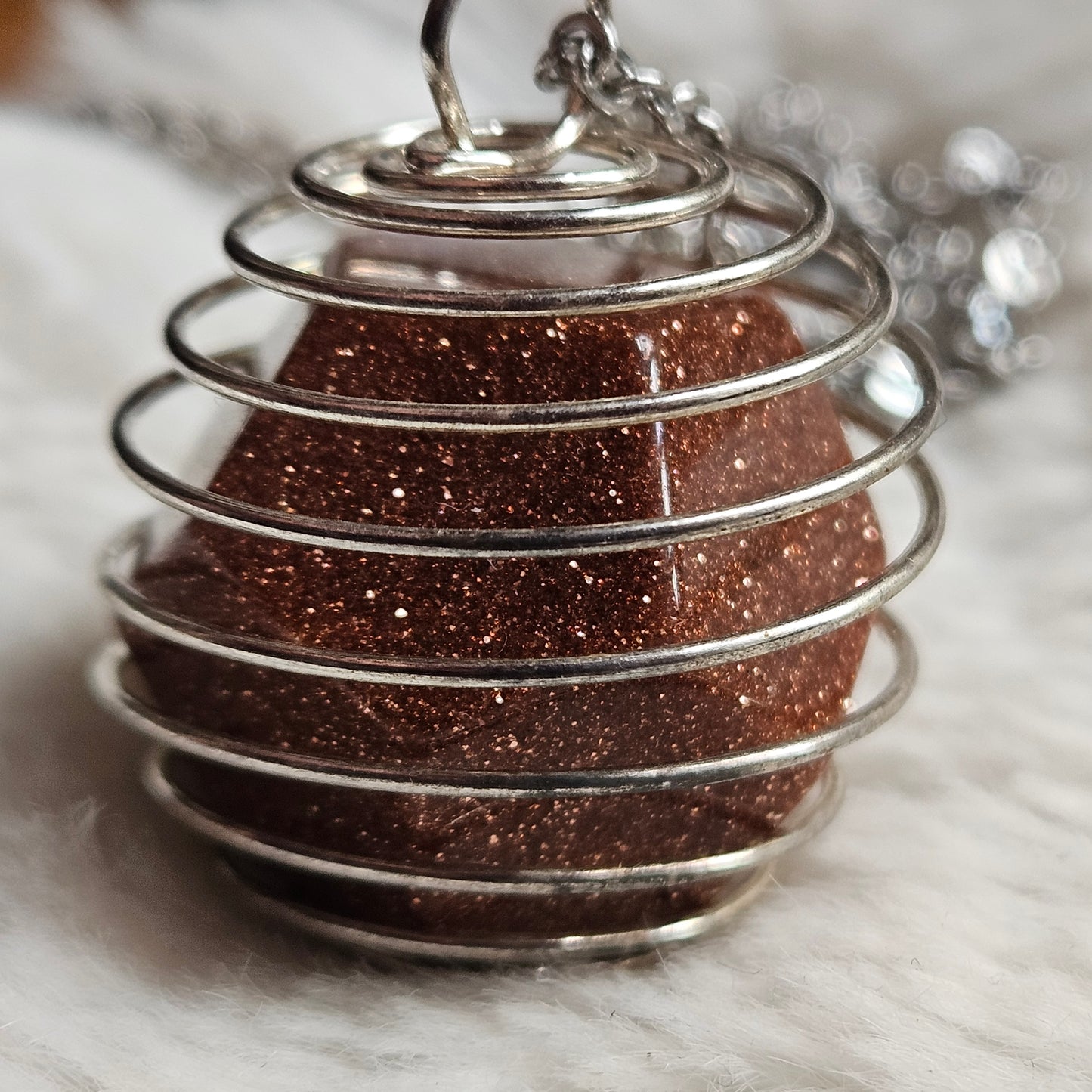 Goldstone in a Spiral necklace