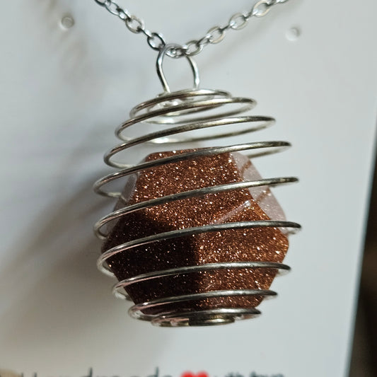 Goldstone in a Spiral necklace