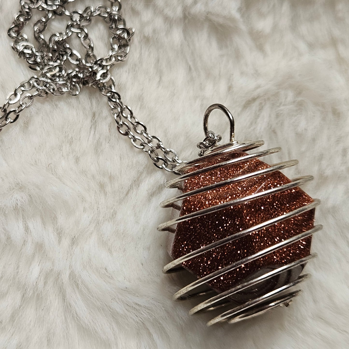 Goldstone in a Spiral necklace