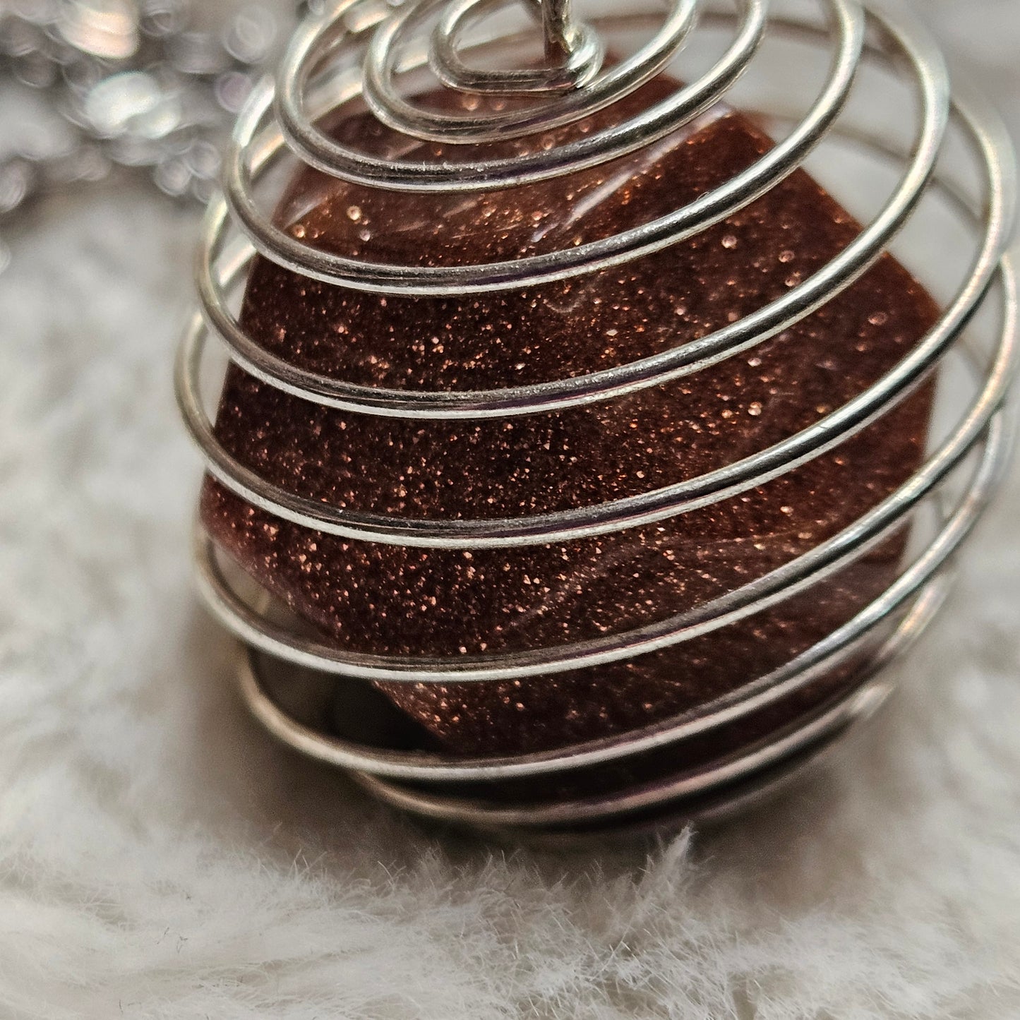 Goldstone in a Spiral necklace